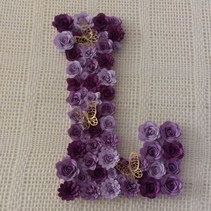 wooden letter decorated with very cute flowers is decorated, and measures 13 in